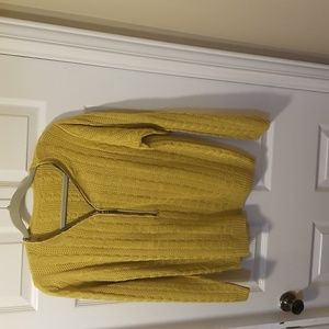 A beautiful yellow mustard knitted sweater